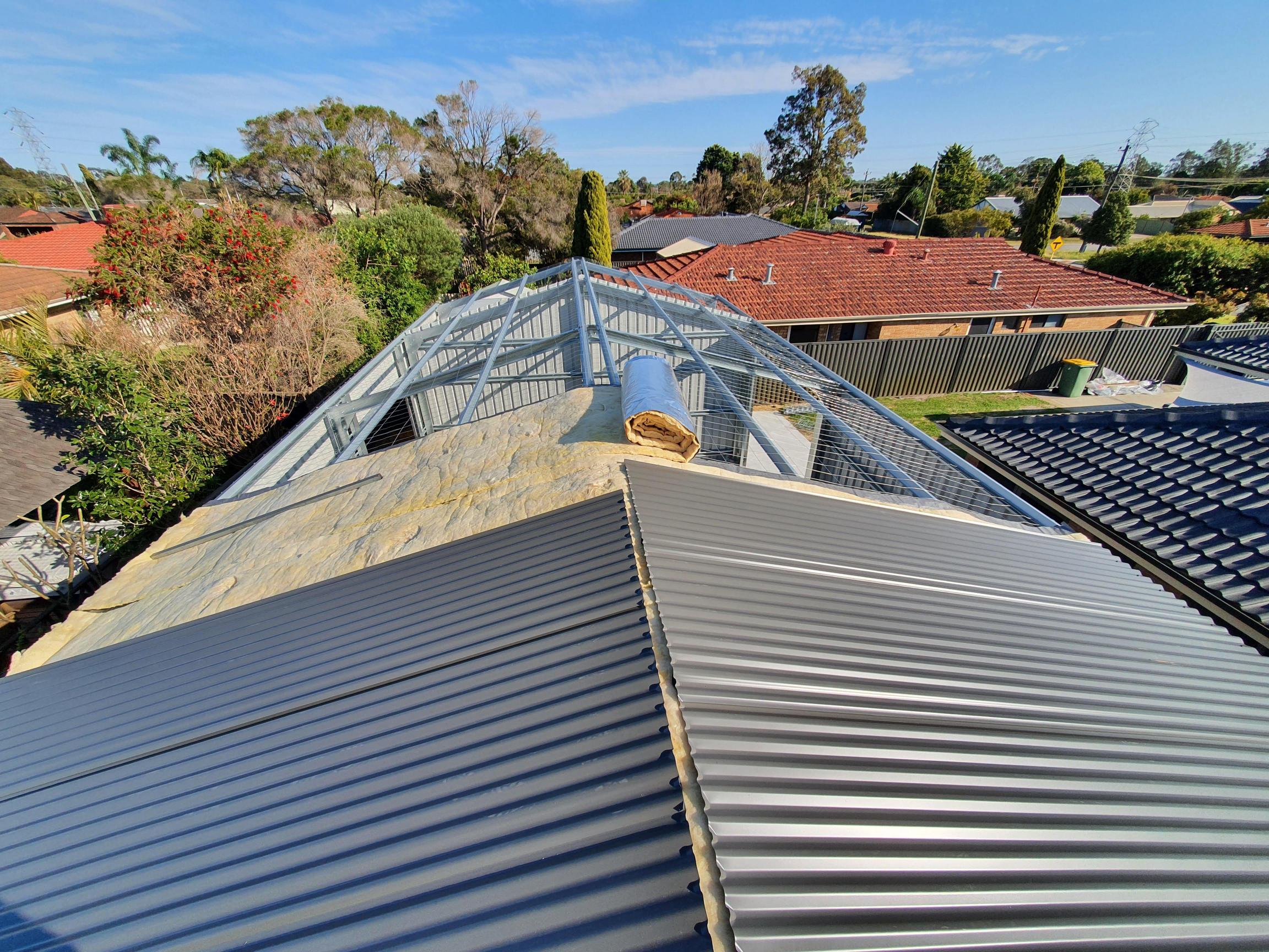 shed roof under construction - installed over insulation with steel roof framing